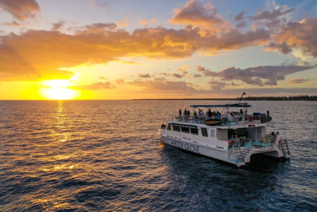 sunset cruise on a boat on the ocean in hawaii
