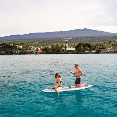 a man swimming in a body of water
