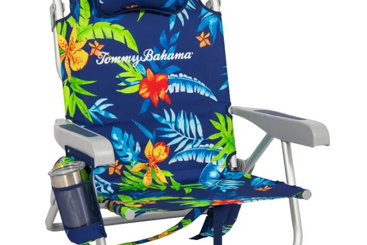 Colorful beach chair with tropical floral pattern and built-in cup holder.