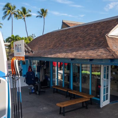 a train is parked on the side of a building